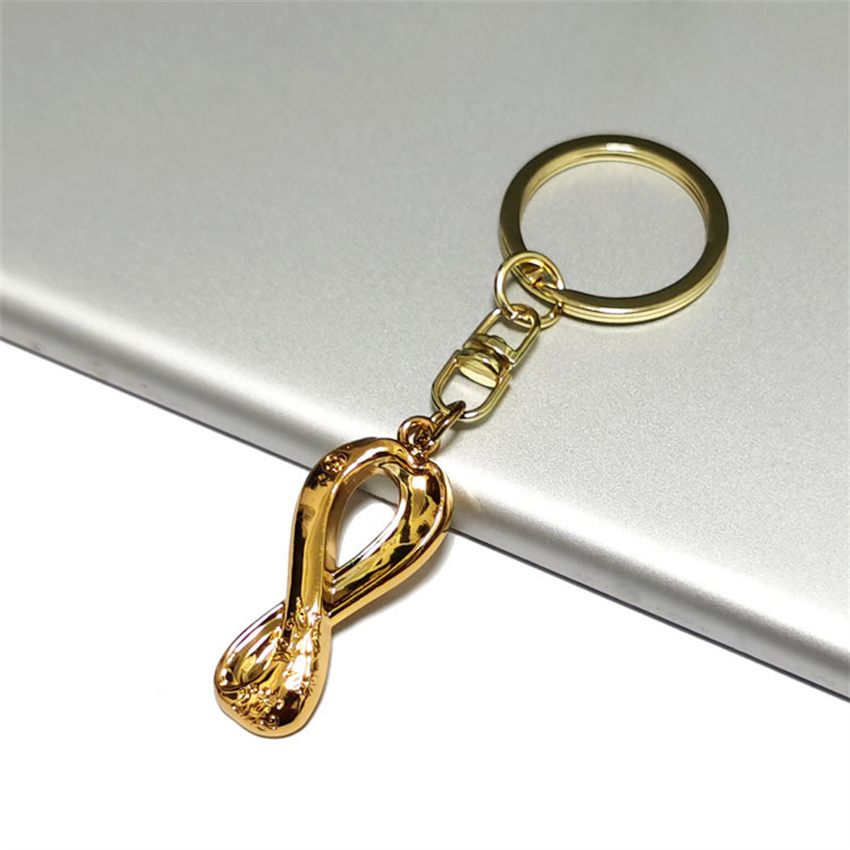 Factory Wholesale Custom Logo 2022 Qatar World Cup Fan Souvenir Soccer Badge Fan Gift Pendant Metal Keychain